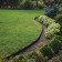 Bordure de jardin flexible noire - 5 cm x 10 mètres avec 20 piquets d’ancrage
